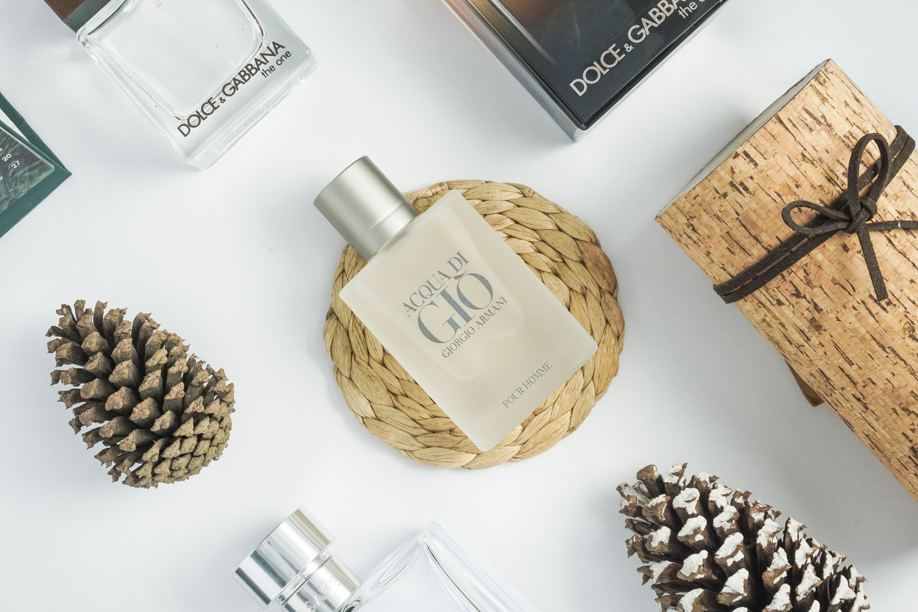 Clear Glass Perfume Bottle on Brown Woven Basket